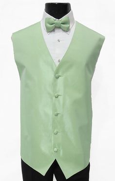 Perry Ellis Meadown Green Fullback Vest - 2XL   This is a quality tuxedo fullback vest. It was made for the tuxedo vest rental industry. This tuxedo vest is far superior in quality and durability to the cheap tuxedo vest you see flooding Ebay now. This item is in good shape and perfect for your formal event. This listing is for a Perry Ellis "Meadow Green" Fullback vest. Vest features a faint polka dot pattern (see below for a close up) and Classic Sleeveless Spring Suits, Green Fitted Classic Vest, Elegant Fitted Green Vest, Fitted Sleeveless Solid Suit, Fitted Sleeveless Solid Color Suit, Formal Tuxedo Style Vest, Formal Tuxedo Style Sleeveless Vest, Fitted Summer Tuxedo For Wedding, Sleeveless Tuxedo Vest For Formal Events