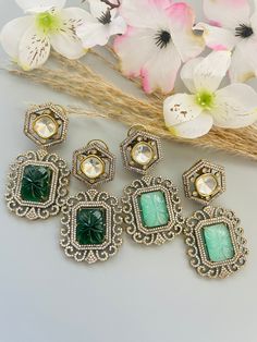 Sabyasachi inspired victorian style carved stone and AD statement earring in emerald green, and mint green color. Designer statement drop earring is made with uncut kundan,carved monalisa stone and american diamond details. Inspire your style with this beautiful earring for wedding, cocktail, reception or any special occasion.  All orders Ship same day if placed before 4:00 PM EST  Earring Length: 3 inches Earring Width: 1 inch. Create beautiful memory for any occasion with elegant jewelry for y Ornate Silver Earrings With Stone Work, Ornate Heavy Jhumkas, Festive Kundan Danglers With Ornate Style, Festive Ornate Kundan Danglers, Heavy Ornate Danglers For Festive Occasions, Ornate Kundan Earrings With Stone Work, Ornate Kundan Jhumkas, Victorian Green Earrings For Wedding, Ornate Heavy Danglers Drop Earrings