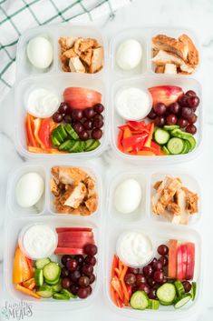 four plastic containers filled with different types of food