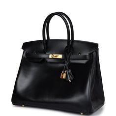 This Birkin in Black boxcalf leather with gold hardware has tonal stitching, front flap with two straps, front toggle closure, clochette with lock and two keys, and double rolled handles The interior is lined with Black chevre and features one zip pocket with an Hermes engraved pull.Collection: AOrigin: FranceCondition: Never worn (plastic on hardware)Accompanied by: Hermes box, dustbag, ribbon, rainhat, carebook, clochette, clochette dustbag, lock, two keysMeasurements: 11" width x 13.75" height x 7" depth; 4" handle drop Luxury Everyday Calf Leather Bag With Lock, Luxury Calf Leather Bag With Lock, Timeless Calf Leather Bag With Hasp Closure, Business Bags With Lock In Calf Leather, Formal Calf Leather Bag With Lock, Leather Bags With Lock For Everyday Luxury, Classic Leather Bags With Lock, Business Bags In Calf Leather With Hasp Closure, Business Bags With Hasp Closure In Calf Leather