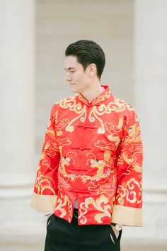 An exquisite and comfortable jacket decorated with a gold dragon to symbolize good luck for the marriage. This changshan is the male equivalent of the classic red cheongsam. Check out our other jackets and changshans at www.eastmeetsdress.com. The Details: - Dragon embroidery jacket with frog buttons - Medium thick polyester fabric - Breathable, comfortable formal wear - Full inner lining, pockets Sizing: - This jacket comes in standard sizes. Size chart (chest, waist in cm): S106100 M110104 L11 Embroidered Long Sleeve Outerwear For Ceremony, Gold Wedding Outerwear With Gold Embroidery, Traditional Outerwear With Stand Collar For Wedding, Traditional Stand Collar Outerwear For Wedding, Red Long Sleeve Outerwear For Wedding, Wedding Outerwear With Gold Embroidery And Long Sleeves, Wedding Groom Outfit, Banquet Outfit, Cleopatra Dress