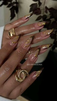 #aesthetic #nailsofinstagram #art #gold Gold Accent Nail Ideas, Dark Gold Nails, Gold Maximalist Nails, Liquid Gold Nails, Almond Nails Designs Black Women, Sade Nails Aesthetic, Gold Themed Nails, Brown And Gold Nails Acrylic, Gold Almond Acrylic Nails