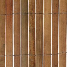 a close up view of a wooden fence