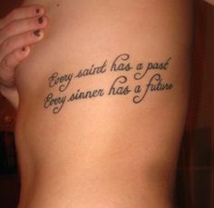 a woman with a tattoo on her stomach that says, every said kiss a must