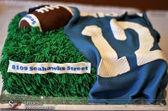 a cake that is made to look like a football field with a ball on it