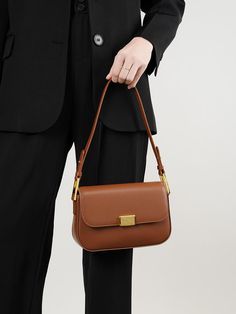 Everyday Square Baguette Bag With Gold-tone Hardware, Elegant Handheld Flap Bag For Everyday Use, Handheld Flap Bag With Gold-tone Hardware For Everyday, Minimalist Workwear Bags With Gold-tone Hardware, Workwear Clutch Shoulder Bag, Minimalist Work Bags With Gold-tone Hardware, Versatile Clutch Shoulder Bag For Work, Everyday Clutch Shoulder Bag With Gold-tone Hardware, Modern Brown Clutch Bag