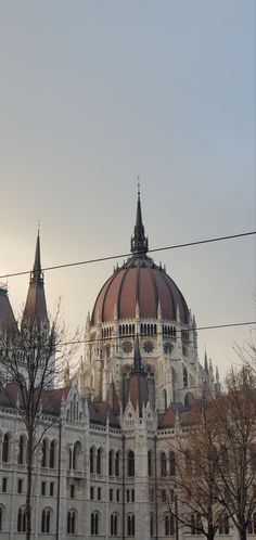 a large building with two towers on top