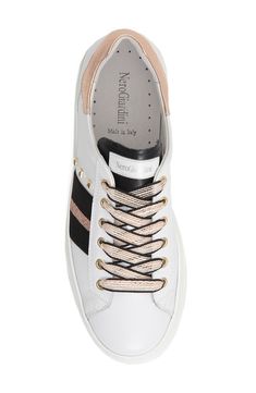 Made in Italy, this chic leather sneaker is brought to life by classic stripes, sparkly accents and brassy studded details. Style Name:Nerogiardini Striped Studded Sneaker (Women). Style Number: 6178295. Available in stores. Chic Leather, Chuck Taylor Sneakers, White Rose, Women Style, Up Styles, Sneakers White, Leather Sneakers, Black Stripes, Converse Sneaker