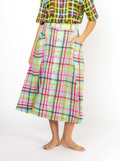 Green Midi Length Lined Skirt, Green Lined Midi Skirt, Green Relaxed Midi Skirt, Green Midi-length Bottoms For Summer, Green Midi-length Summer Bottoms, Green Midi Length Bottoms For Summer, Green Gathered Midi Length Skirt, Green Skirt With Pockets For Beach, Green Midi Bottoms With Elastic Waistband