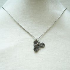 "❖ Bicycle Charm 3D: in Antique Silver Pewter. Approx: 1/2 X 1\" Lead free pewter charm made in U.S.A. ❖ Hand Stamped Initial Charm - Antique Silver Pewter 3/8\" (9mm) ❖ Click below for Bicycle necklace in Antique Gold Pewter: https://www.etsy.com/listing/123733551 ❖ Add a birthstone or Freshwater pearl for $3.50 https://www.etsy.com/listing/110444872 ❖ Additional Hand Stamped Initial Charms $4.50 each: https://www.etsy.com/listing/107021419 ❖ Go back to Short and Bald Jewelry http://www.etsy.co Silver Initial Pendant Charm Necklace Nickel Free, Symbolic Silver Initial Pendant Charm Necklaces, Vintage Personalized Silver Charm Necklace, Personalized Vintage Silver Charm Necklace, Vintage Style Personalized Silver Charm Necklace, Symbolic Silver Cadmium-free Charm Necklace, Bicycle Necklace, Silver Monogram, Necklace Initial