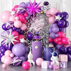 an assortment of balloons and decorations for a birthday party