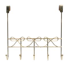 a coat rack with three hooks and two coats hanging from it's sides, against a white background