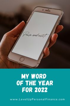 a person holding a cell phone with the text my word of the year for 2012