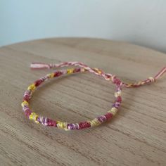 A Handmade Bracelet Or Anklet Woven With Shades Of Pink And Yellow Colors. A Friendship Or Statement Bracelet Perfect For This Summer! Approx. 9 Inches/ 30 Centimeters Long. 10 Woven Bracelets For $25. Gold Knot Bracelet, Arm Cuff Bracelet, Silver Money Clip, Faux Leather Bracelets, Stretchy Beaded Bracelet, Wood Bead Bracelet, Handmade Jewelry Bracelets, Wide Cuff Bracelets, Floral Bracelet