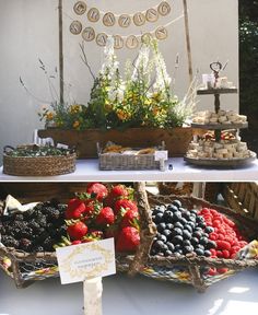 an assortment of fruits and pastries on display at a wedding or bridal party