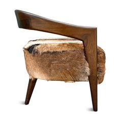 a wooden chair with fur on it