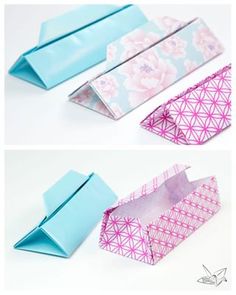 an origami box that is folded up to look like it has flowers on it