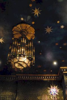 the ceiling is decorated with stars and lights