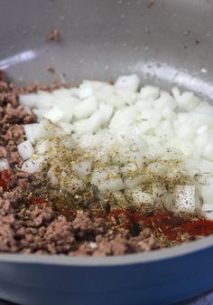 the food is being cooked in the pan on the stove top and ready to be put into the oven