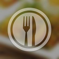 the fork and knife symbol is displayed on a blurred background