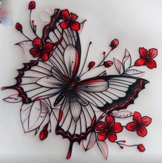 a drawing of a butterfly with red flowers on it