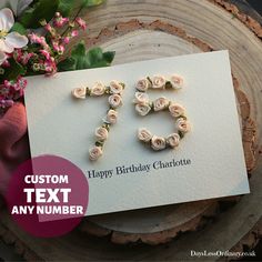 a birthday card with flowers and the word happy birthday charlotte on it next to a flower bouquet