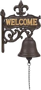 a bell with the word welcome hanging from it's side on a white background