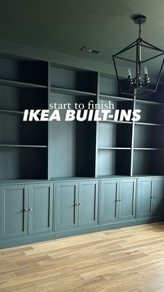 an empty room with blue bookcases and wood flooring that says, start to finish ikea built - ins