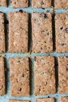 several squares of food sitting on top of a table