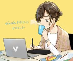 a woman sitting at a desk with a laptop and coffee cup in front of her