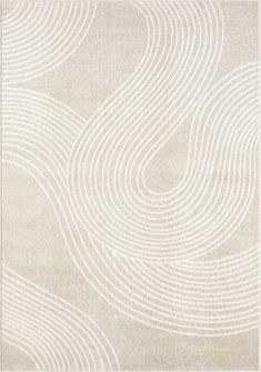 a white rug with wavy lines on it