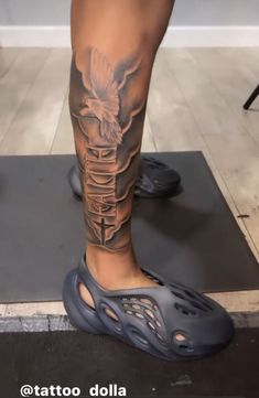 a person with a tattoo on their leg