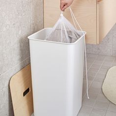 Slimline lidded laundry basket. Great for popping in the corner of a bedroom, utility room, landing etc. Available in black or white. We Work Office, Bathroom Laundry Baskets, White Bin, Laundry Box, Black Bin, Declutter Bedroom, Laundry Basket With Lid, Traditional Shelves, Laundry Bin