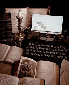 an old fashioned typewriter surrounded by books