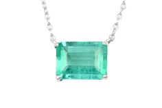 Featured here is a 1.50-carat stunning, Colombian emerald necklace in fine sterling silver. Displayed in the center is a medium-light green emerald with very good eye clarity, accented by a simple four-prong silver mount, allowing for the emerald to be shown in full view. The earth mined, green Colombian emerald has a desirable lush green color with excellent qualities. An 18 inch is attached to the emerald pendant. This necklace is ideal for everyday use and is the perfect accessory to any outf Jupiter Fl, Tiny Bow, Emerald Pendant, Colombian Emeralds, Emerald Necklace, Emerald Engagement, May Birthstone, Emerald Engagement Ring, Emerald Jewelry