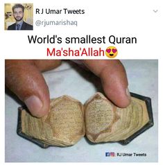 an image of someones hand holding two pieces of paper with the words world's smallest quran written on it