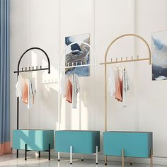 an image of clothes hanging on racks in the living room with blue and white furniture