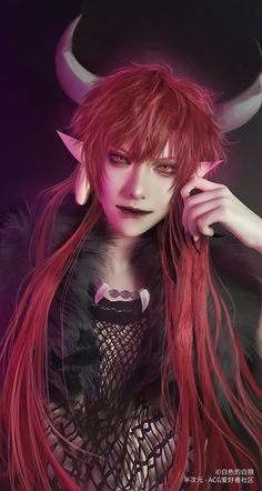 a woman with long red hair and horns on her head