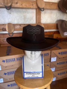 MADE AT AND BY BIGGAR HAT STORE IN DECATUR, TX This size 7 Long Oval, 10x Chocolate felt hat is a perfect addition to any cowboy/girl's collection! The pencil rolled 4 1/4" brim, hand-stitched boot stitch crown and slightly distressed design make this a head turning piece. This hat is made of a rabbit/ hare blend which reflects the price. All of the hats on our Etsy shop are NOT custom, but pre- designed fashion hats that are made in our store. If you are interested in a custom hat, please visit our website at biggarhatstore.com, or come into our store in Decatur, TX! Fitted Brown Western Hat, Fitted Brown Country Style Top Hat, Fitted Western Brown Hat Bands, Fitted Brown Hat For Ranch, Fitted Brown Western Hat Bands, Fitted Brown Western Top Hat, Custom Fitted Hat For Western-themed Events, Custom Fitted Hats For Western-themed Events, Custom Brown Top Hat For Western-themed Events