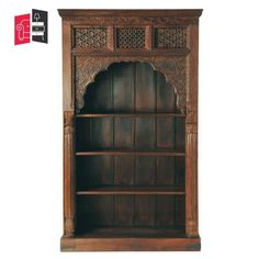 an old wooden bookcase with carvings on it