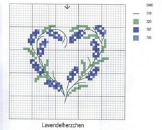 a cross stitch heart with blue flowers in the shape of a heart on a graph paper