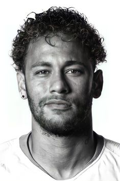 a black and white photo of a man with curly hair