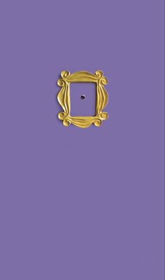 a gold frame on a purple background