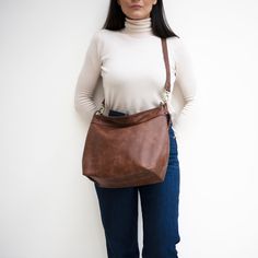 "' HELEN ' Leather Hobo Bag in N E W rich brown distressed leather - Available only in MEDIUM size The ' Helen ' is a collection of comfortable shoulder / crossbody hobo bags made from the best quality and soft leathers. In this listing we feature the hobo bag in brown distressed leather. Distressed leathers gain a vintage look as they age and that makes them unique, durable and long-lasting. The bag is designed with a large main compartment with a secure top zip closure and fully lined in water Hobo Crossbody Bag, Best Purses, Hobo Purse, Brown Leather Shoulder Bag, Hobo Bags, Leather Hobo Bag, Hobo Handbags, Women Leather, Distressed Leather