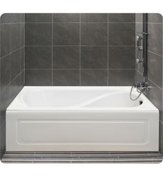 a white bath tub sitting inside of a bathroom next to a tiled shower head and wall