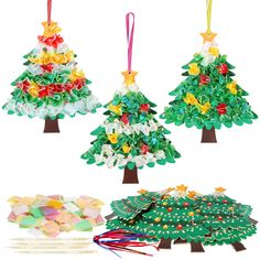 three christmas trees made out of paper and colored beads, one with bows on it