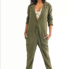 Free People Jumpsuit Utility 1 Piece Olive Snap Front Oversized Higher Ground Button Up Front And Cargo Pockets Zipper Chest Pockets New Without Tags * Size: S Retail Price: $198.00 100% Cotton * There Is A Line Through The Tag To Prevent Store Return 38’’ Around Bust 38” Around Waist 24" Inseam 54'' Long Oversized Jumpsuits And Rompers With Pockets For Loungewear, Utility Style Jumpsuits And Rompers With Button Closure, Chic Jumpsuits And Rompers With Pockets For Daywear, Utility Jumpsuits And Rompers With Relaxed Fit And Button-up, Utility Style Relaxed Fit Jumpsuits And Rompers, Fall Utility Jumpsuits And Rompers With Buttons, Utility Style Jumpsuits And Rompers With Buttons For Fall, Relaxed Fit Jumpsuits And Rompers With Buttons For Fall, Utility Long Sleeve Jumpsuits And Rompers With Button Closure