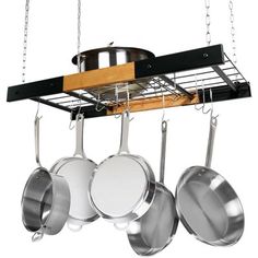 pots and pans are hanging from the ceiling