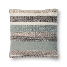 a gray and white striped pillow on a white background