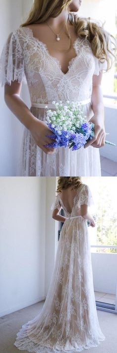 a woman in a wedding dress holding flowers